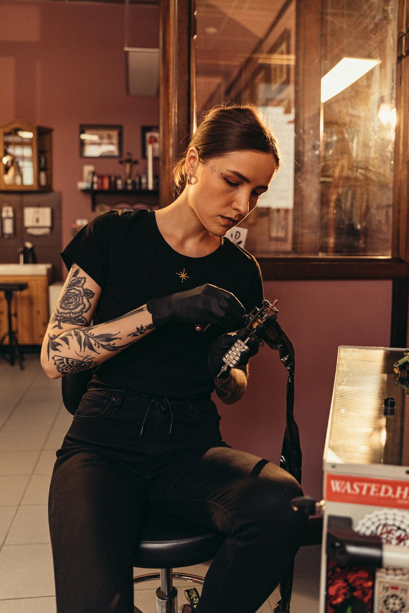 Tattoo artist working